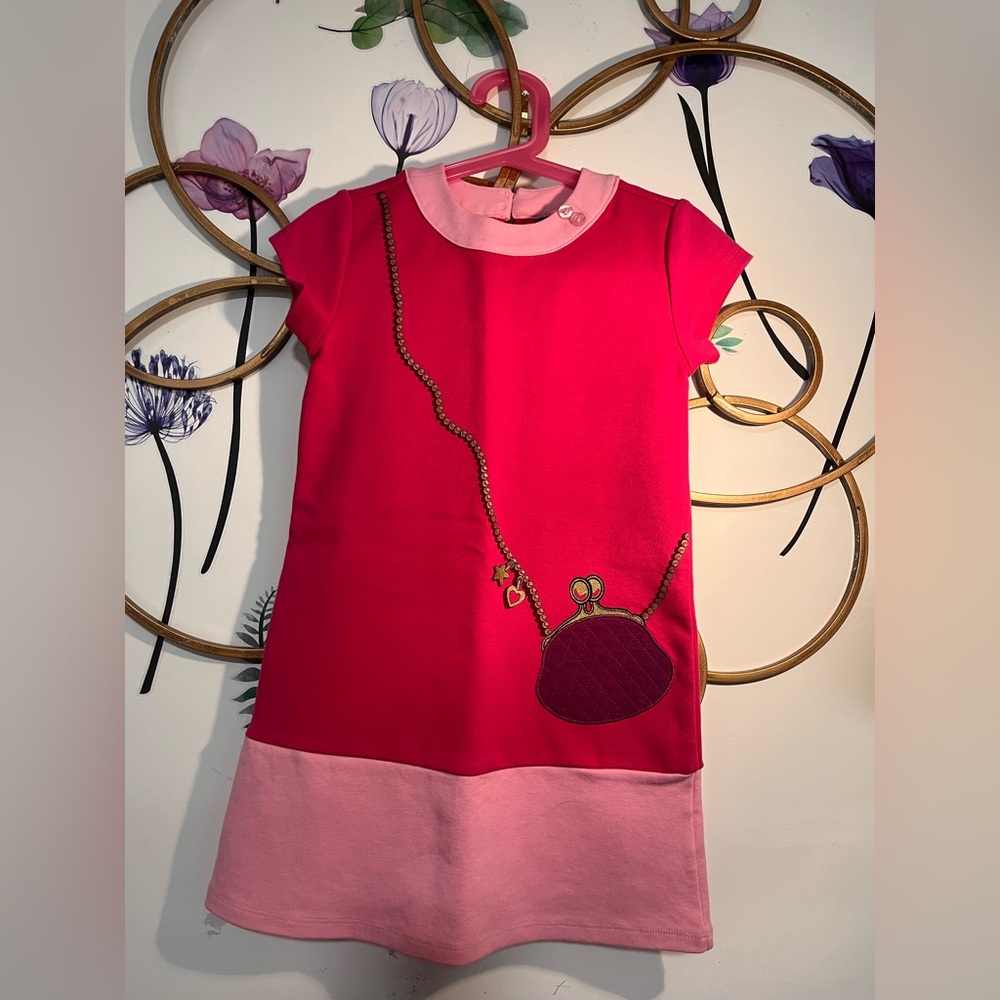Pink and Fuishia Dress with Purse Design
54% Cotton, 42% polyester, 4% Spandex
